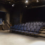 Rows of chairs inside theatre