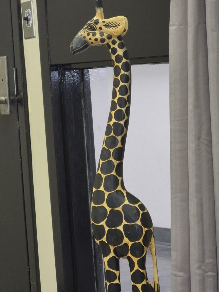 This is Bernard, a wooden state of a giraffe that's about four feet high. Hello, Bernard.